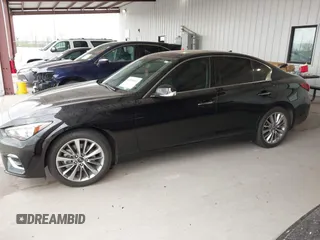 2023 Infiniti Q50 Luxe with VIN JN1EV7BPXPM512588, listed as a IAAI auction lot 41819661 with 30,817 mi miles and . Bid and sale history available at DreamBid. Image 2.