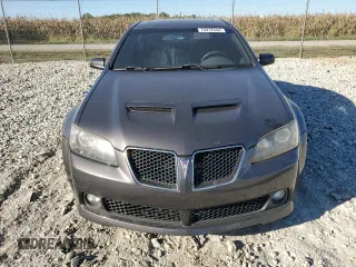 2009 Pontiac G8 with VIN 6G2ER57749L235662, listed as a Copart auction lot 73972344 with 146,384 mi miles and Salvage Title. Bid and sale history available at DreamBid. Image 5.