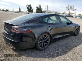 2022 Tesla Model S Plaid z VIN 5YJSA1E64NF461218, wystawiony jako Copart lot #84467644 z przebiegiem Nie podano mil oraz Szkoda całkowita • Salvage title. Historia ofert i sprzedaży dostępna na DreamBid. Obrazek 3.