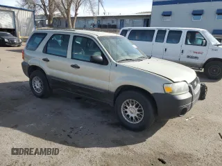 2005 Ford Escape XLS Value with VIN 1FMYU92ZX5KA93124, listed as a Copart auction lot 45337585 with 218,826 mi miles and Salvage Title. Bid and sale history available at carsss.com. Image 4.