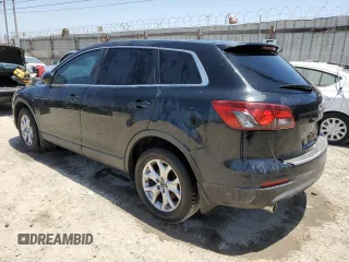 2015 Mazda CX-9 Sport z VIN JM3TB2BAXF0447315, wystawiony jako Copart lot #60842505 z przebiegiem 122 281 mil mil oraz Szkoda całkowita • Salvage title. Historia ofert i sprzedaży dostępna na DreamBid. Obrazek 2.