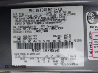 2012 Ford Fusion Hybrid z VIN 3FADP0L33CR289548, wystawiony jako IAAI lot #41905806 z przebiegiem 121 233 mil mil oraz . Historia ofert i sprzedaży dostępna na DreamBid. Obrazek 9.