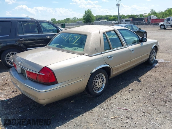 2000 Mercury Grand Marquis GS z VIN 2MEFM74W3YX610461, wystawiony jako IAAI lot #42162767 z przebiegiem 181 400 mil mil oraz . Historia ofert i sprzedaży dostępna na DreamBid. Obrazek 4.