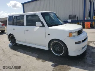 2004 Scion xB with VIN JTLKT324340167884, listed as a Copart auction lot 52494435 with 157,671 mi miles and Salvage Title. Bid and sale history available at carsss.com. Image 4.