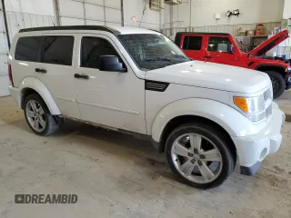 2011 Dodge Nitro Heat with VIN 1D4PT4GK4BW567965, listed as a Copart auction lot 49171705 with Not Provided miles and Clean Title. Bid and sale history available at DreamBid. Image 4.