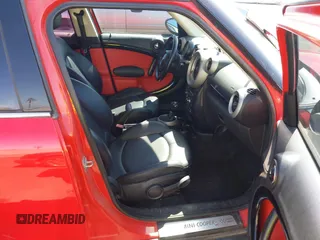 2012 MINI Countryman S with VIN WMWZC5C55CWL62018, listed as a IAAI auction lot 42036503 with 141,115 mi miles and . Bid and sale history available at DreamBid. Image 5.