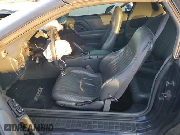 1999 Chevrolet Camaro Z28 z VIN 2G1FP22G2X2123246, wystawiony jako Copart lot #42869405 z przebiegiem 126 792 mil mil oraz Szkoda całkowita • Salvage title. Historia ofert i sprzedaży dostępna na DreamBid. Obrazek 7.