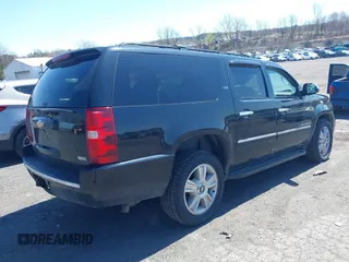 2009 Chevrolet Suburban LTZ with VIN 1GNFK36399J124158, listed as a IAAI auction lot 42063097 with 204,856 mi miles. Bid and sale history available at carsss.com. Image 4.