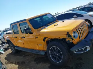 2021 Jeep Gladiator Overland z VIN 1C6HJTFG3ML552660, wystawiony jako IAAI lot #41636232 z przebiegiem 37 769 mil mil oraz . Historia ofert i sprzedaży dostępna na DreamBid. Obrazek 14.