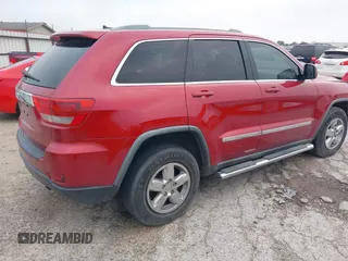 2011 Jeep Grand Cherokee Laredo with VIN 1J4RS4GG1BC673290, listed as a IAAI auction lot 42042557 with 147,590 mi miles and . Bid and sale history available at DreamBid. Image 4.