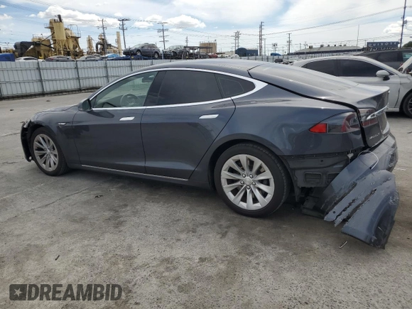 2016 Tesla Model S 70 with VIN 5YJSA1E1XGF149430, listed as a Copart auction lot 51339015 with 104,917 mi miles and Salvage title. Bid and sale history available at DreamBid. Image 2.