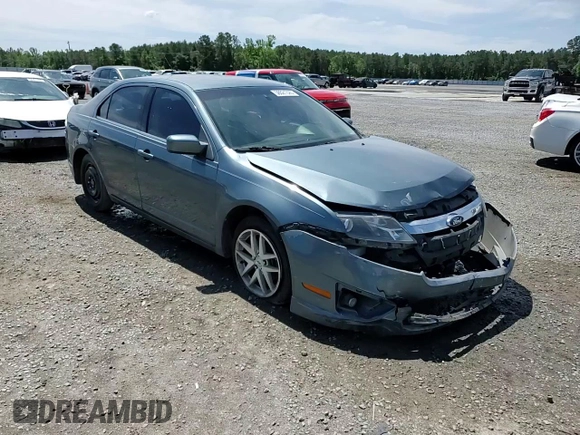 2012 Ford Fusion SEL z VIN 3FAHP0JA1CR182047, wystawiony jako Copart lot #56521525 z przebiegiem 200 523 mil mil oraz Szkoda całkowita • Salvage title. Historia ofert i sprzedaży dostępna na DreamBid. Obrazek 14.
