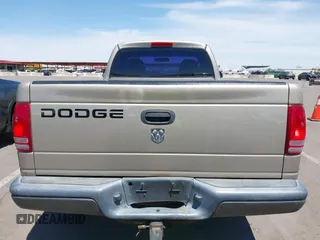 2002 Dodge Dakota with VIN 1B7FL16X72S642881, listed as a IAAI auction lot 42153560 with 220,917 mi miles and . Bid and sale history available at carsss.com. Image 16.