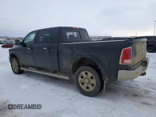 2014 Ram 3500 Laramie with VIN 3C63R3ML6EG325772, listed as a Copart auction lot 87158104 with 495,759 mi miles and Salvage Title. Bid and sale history available at carsss.com. Image 2.