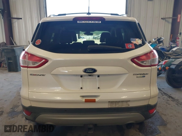 2013 Ford Escape Titanium with VIN 1FMCU9J96DUC60268, listed as a IAAI auction lot 42095407 with 105,307 mi miles and . Bid and sale history available at DreamBid. Image 16.
