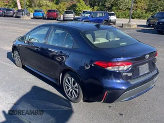 2021 Toyota Corolla Hybrid LE with VIN JTDEAMDE0MJ009233, listed as a Copart auction lot 47366915 with 212,244 mi miles and Clean Title. Bid and sale history available at carsss.com. Image 3.