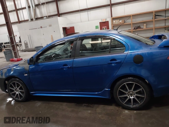 2009 Mitsubishi Lancer ES with VIN JA3AU26U29U036243, listed as a IAAI auction lot 41952044 with 181,650 mi miles. Bid and sale history available at carsss.com. Image 14.