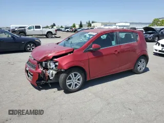 2012 Chevrolet Sonic LT with VIN 1G1JC6SH9C4133623, listed as a Copart auction lot 60065525 with 141,930 mi miles and Salvage title. Bid and sale history available at DreamBid. Image 1.