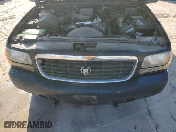 1999 Cadillac Escalade z VIN 1GYEK13R7XR402243, wystawiony jako Copart lot #43269935 z przebiegiem 231 465 mil mil oraz Czysty tytuł • Clean title. Historia ofert i sprzedaży dostępna na DreamBid. Obrazek 12.