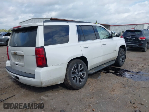 2017 Chevrolet Tahoe LS with VIN 1GNSCAKC5HR312729, listed as a IAAI auction lot 41928484 with 206,999 mi miles and . Bid and sale history available at DreamBid. Image 4.