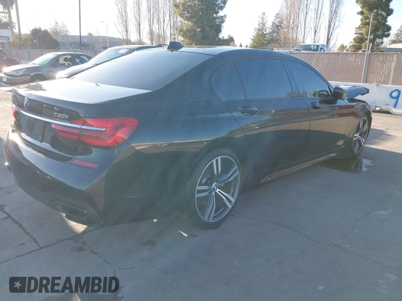 2018 BMW 7 Series 750i with VIN WBA7F0C50JGM24160, listed as a IAAI auction lot 41448519 with 138,742 mi miles. Bid and sale history available at carsss.com. Image 4.