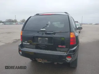 2002 GMC Envoy SLT with VIN 1GKDT13S222143135, listed as a IAAI auction lot 42136672 with 206,064 mi miles. Bid and sale history available at carsss.com. Image 12.