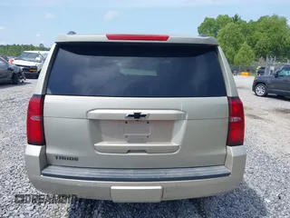 2015 Chevrolet Tahoe LT z VIN 1GNSCBKC7FR140125, wystawiony jako IAAI lot #42279760 z przebiegiem 201 335 mil mil oraz . Historia ofert i sprzedaży dostępna na DreamBid. Obrazek 16.