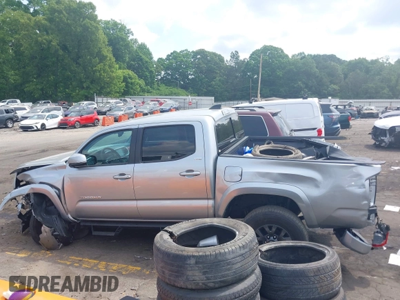 2023 Toyota Tacoma SR with VIN 3TYCZ5AN2PT176554, listed as a IAAI auction lot 42148651 with 15,255 mi miles and . Bid and sale history available at DreamBid. Image 14.