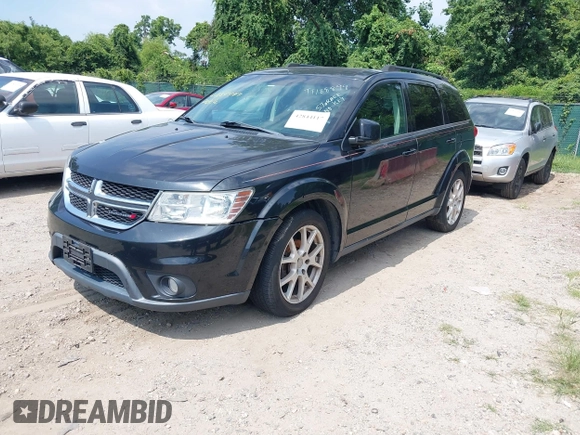 2012 Dodge Journey SXT with VIN 3C4PDDBG3CT144881, listed as a IAAI auction lot 42844117 with 184,804 mi miles and . Bid and sale history available at DreamBid. Image 2.