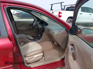 1998 Ford Taurus SE Comfort z VIN 1FAFP53S2WA255080, wystawiony jako IAAI lot #41541015 z przebiegiem 196 604 mil mil oraz . Historia ofert i sprzedaży dostępna na DreamBid. Obrazek 5.