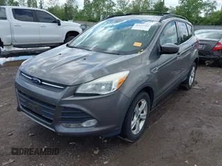 2013 Ford Escape SE with VIN 1FMCU9GX3DUD35255, listed as a IAAI auction lot 42197543 with 154,359 mi miles and . Bid and sale history available at DreamBid. Image 2.