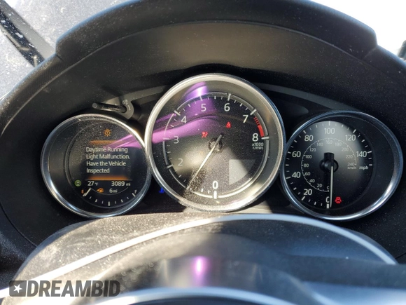 2024 Mazda MX-5 Miata Grand Touring z VIN JM1NDAM73R0607806, wystawiony jako Copart lot #88531435 z przebiegiem 3 089 mil mil oraz Szkoda całkowita • Salvage title. Historia ofert i sprzedaży dostępna na DreamBid. Obrazek 9.