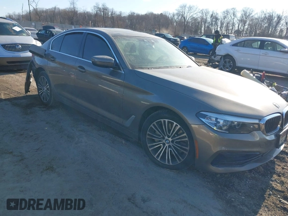 2019 BMW 5 Series 530i xDrive with VIN WBAJA7C54KWW40517, listed as a IAAI auction lot 41427443 with 51,028 mi miles. Bid and sale history available at carsss.com. Image 1.