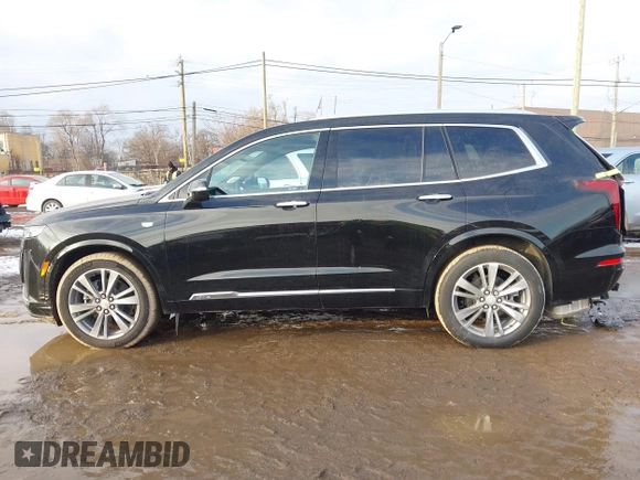 2025 Cadillac XT6 FWD Premium Luxury with VIN 1GYKPCRS6SZ104902, listed as a IAAI auction lot 41565224 with 4,735 mi miles and . Bid and sale history available at DreamBid. Image 14.