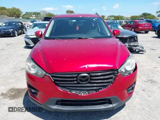 2016 Mazda CX-5 Touring with VIN JM3KE2CY6G0830409, listed as a IAAI auction lot 42049299 with 39,317 mi miles. Bid and sale history available at carsss.com. Image 12.