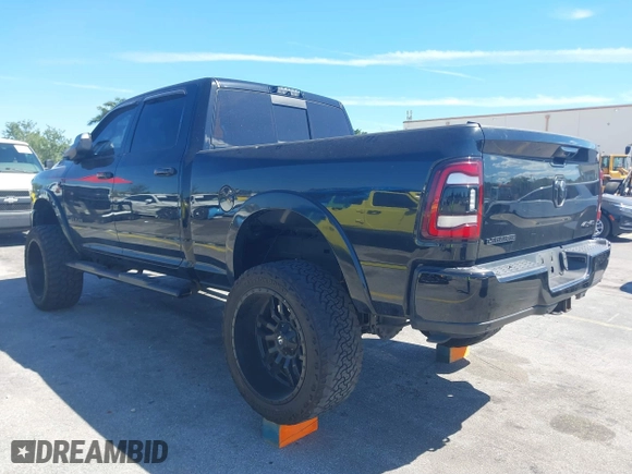2019 Ram 2500 Laramie with VIN 3C6UR5FLXKG710325, listed as a IAAI auction lot 41853777 with 104,286 mi miles. Bid and sale history available at carsss.com. Image 3.