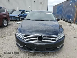 2013 Volkswagen CC Executive z VIN WVWGU7AN0DE529415, wystawiony jako Copart lot #56127135 z przebiegiem 131 345 mil mil oraz Tytuł czysty. Historia ofert i sprzedaży dostępna na DreamBid. Obrazek 5.