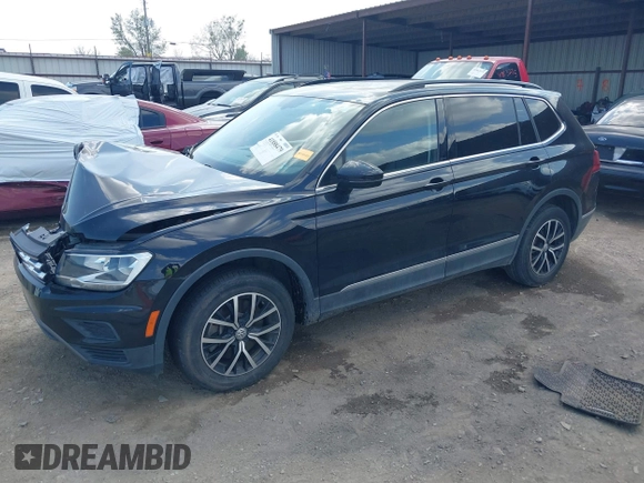 2021 Volkswagen Tiguan SE with VIN 3VV3B7AX3MM157702, listed as a IAAI auction lot 41888479 with 51,807 mi miles and . Bid and sale history available at DreamBid. Image 16.