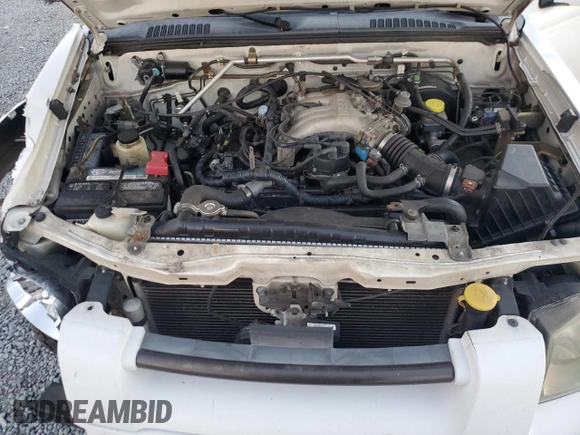2004 Nissan Frontier LE with VIN 1N6ED27T14C451784, listed as a Copart auction lot 83341854 with 137,982 mi miles and Salvage title. Bid and sale history available at DreamBid. Image 12.