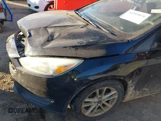 2017 Ford Focus SE with VIN 1FADP3F21HL288487, listed as a IAAI auction lot 41393074 with 87,883 mi miles. Bid and sale history available at carsss.com. Image 6.