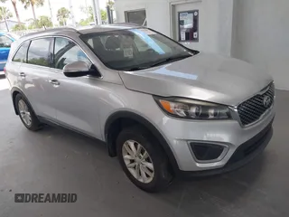 2018 Kia Sorento LX with VIN 5XYPG4A50JG401443, listed as a IAAI auction lot 42125482 with 112,117 mi miles and . Bid and sale history available at DreamBid. Image 1.