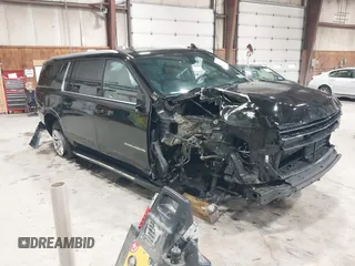2023 Chevrolet Suburban LT with VIN 1GNSKCKD8PR157468, listed as a IAAI auction lot 42450100 with 148,475 mi miles and . Bid and sale history available at DreamBid. Image 1.