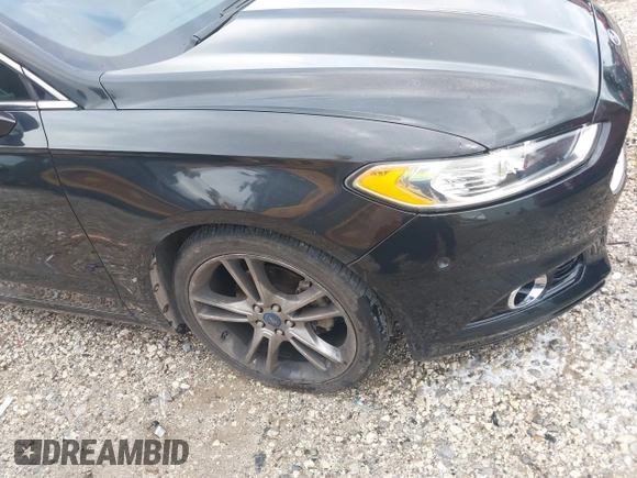 2013 Ford Fusion Titanium with VIN 3FA6P0K95DR153437, listed as a IAAI auction lot 42334754 with 139,623 mi miles and . Bid and sale history available at DreamBid. Image 18.
