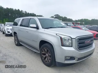 2015 GMC Yukon XL SLT with VIN 1GKS1HKC2FR251672, listed as a IAAI auction lot 42152312 with 232,736 mi miles and . Bid and sale history available at carsss.com. Image 13.