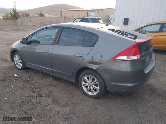 2011 Honda Insight EX with VIN JHMZE2H75BS006078, listed as a IAAI auction lot 41755652 with 209,774 mi miles. Bid and sale history available at carsss.com. Image 3.