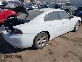 2021 Dodge Charger SXT with VIN 2C3CDXBG5MH605867, listed as a IAAI auction lot 41682336 with 56,660 mi miles and . Bid and sale history available at DreamBid. Image 4.