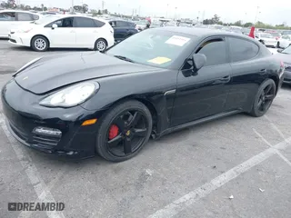 2014 Porsche Panamera with VIN WP0AA2A74EL014840, listed as a IAAI auction lot 41892514 with 79,663 mi miles. Bid and sale history available at carsss.com. Image 2.