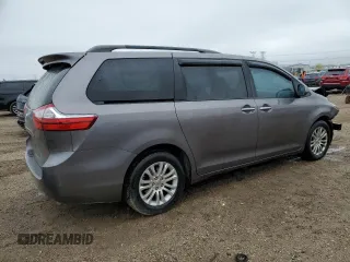 2015 Toyota Sienna XLE with VIN 5TDYK3DC9FS552119, listed as a Copart auction lot 55424515 with 108,307 mi miles and Salvage title. Bid and sale history available at DreamBid. Image 3.