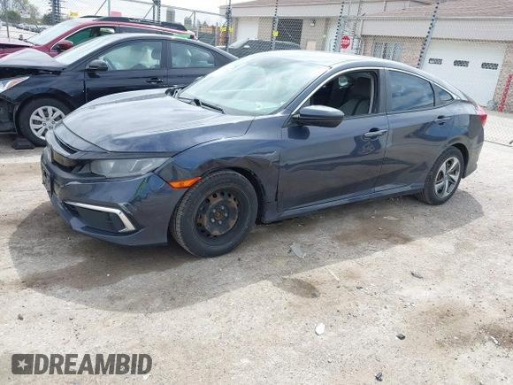 2019 Honda Civic LX with VIN 2HGFC2F61KH564474, listed as a IAAI auction lot 42156385 with 239,694 mi miles and . Bid and sale history available at DreamBid. Image 2.