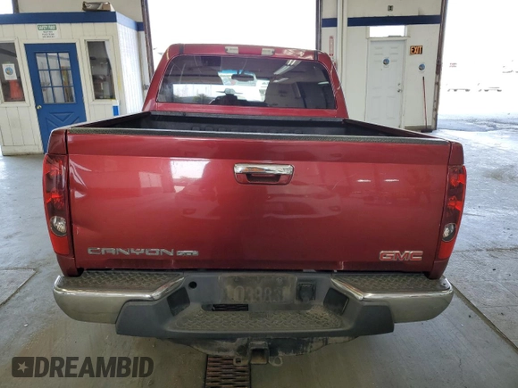 2011 GMC Canyon SLT with VIN 1GTD5NFE0B8106715, listed as a Copart auction lot 70514554 with 163,150 mi miles and Salvage Title. Bid and sale history available at carsss.com. Image 6.